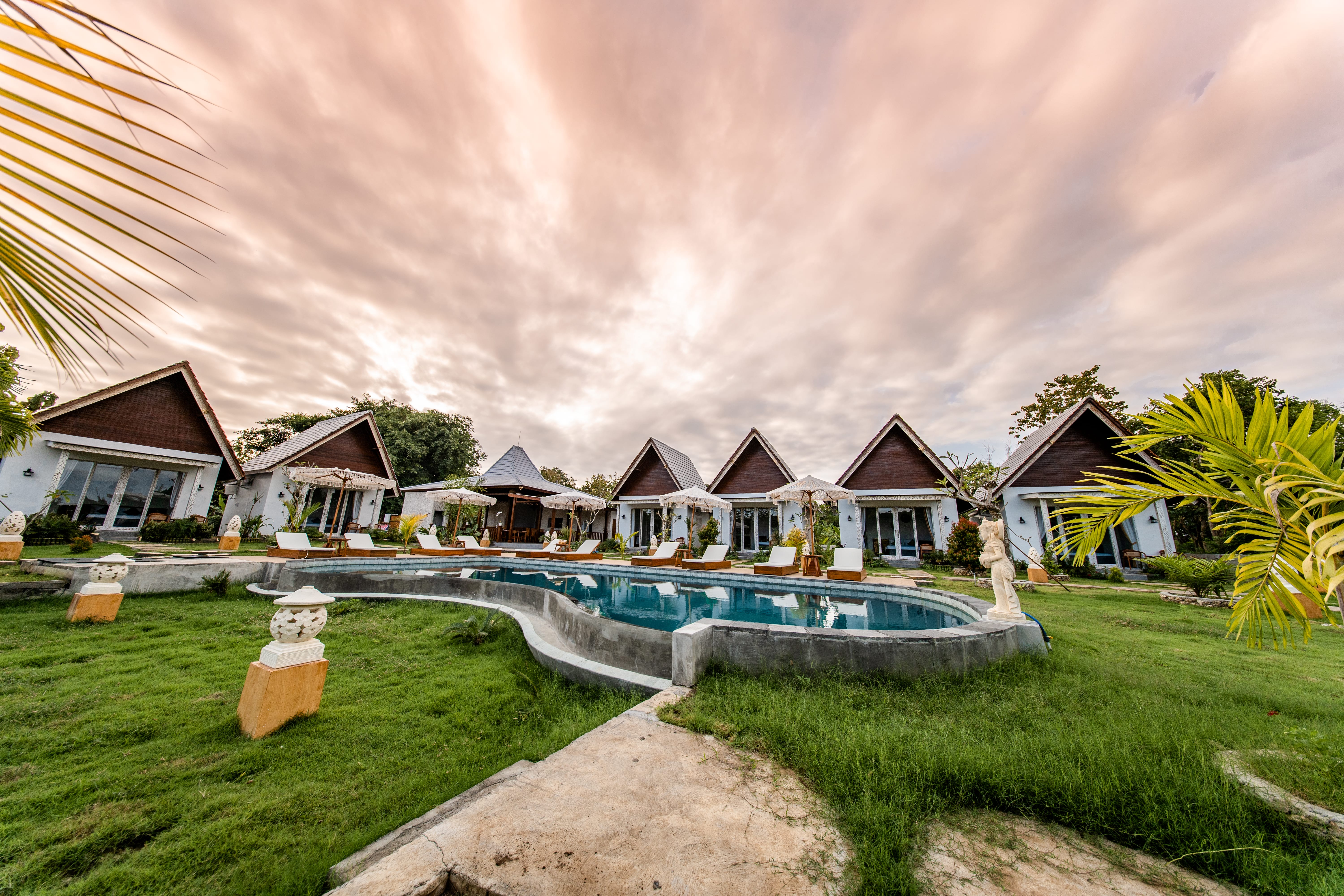 Premium resort room at Lavanaa Nila with modern furnishings and pool view on Nusa Penida